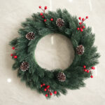 Christmas wreath pine needle red fruit pine cone